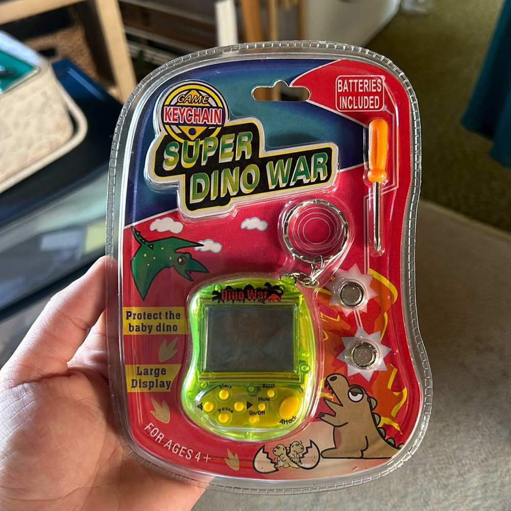 Keychain Super Dino War Game